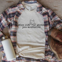 Tee Shirt Printed Adventure Designs - OUTDOOR HIKING Edgy Minimalist When Life Gives You Mountains with Backpack and Hiking Boots Imagery